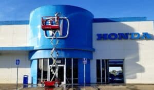 commercial pressure washing a car dealership in Sacramento